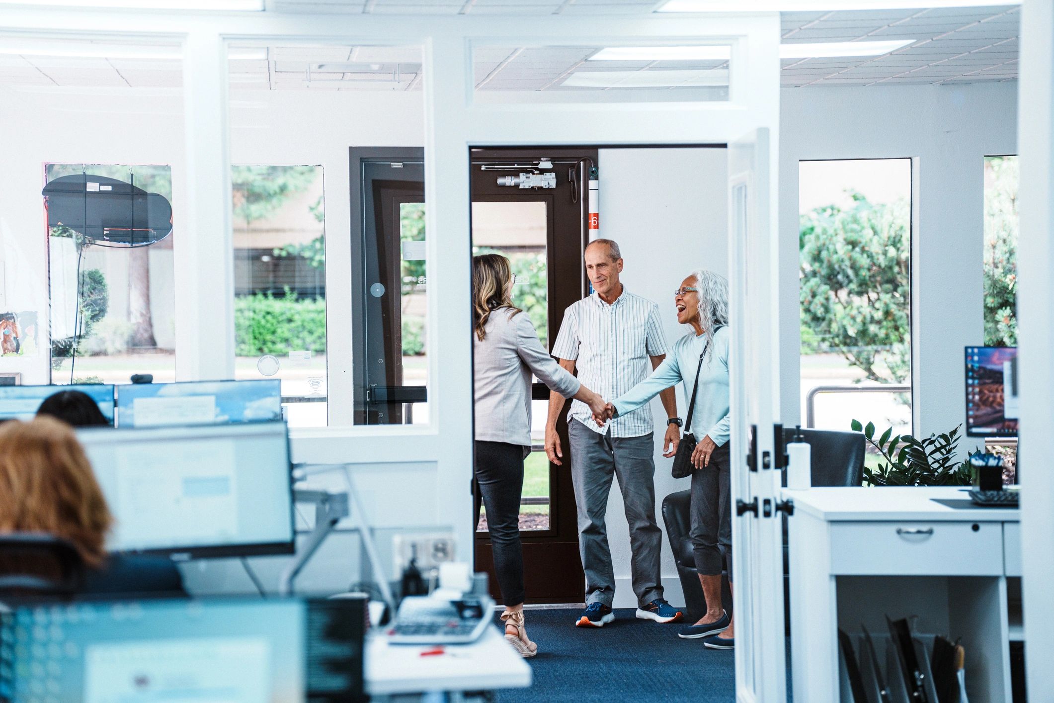 Clients meeting with a financial consultant in an office