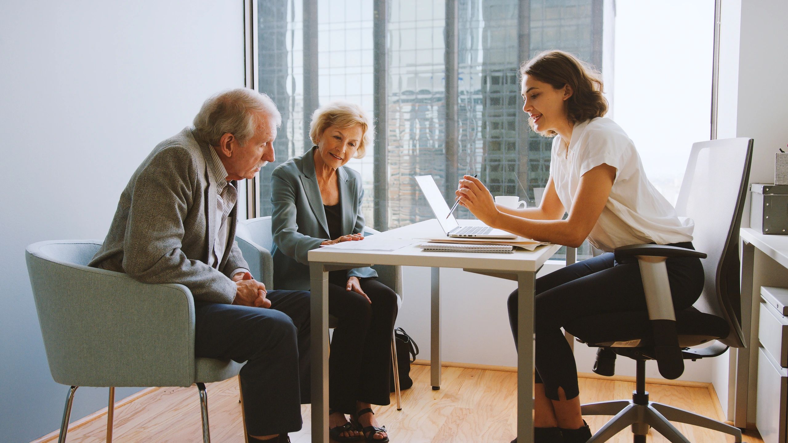 Clients meeting with a financial advisor