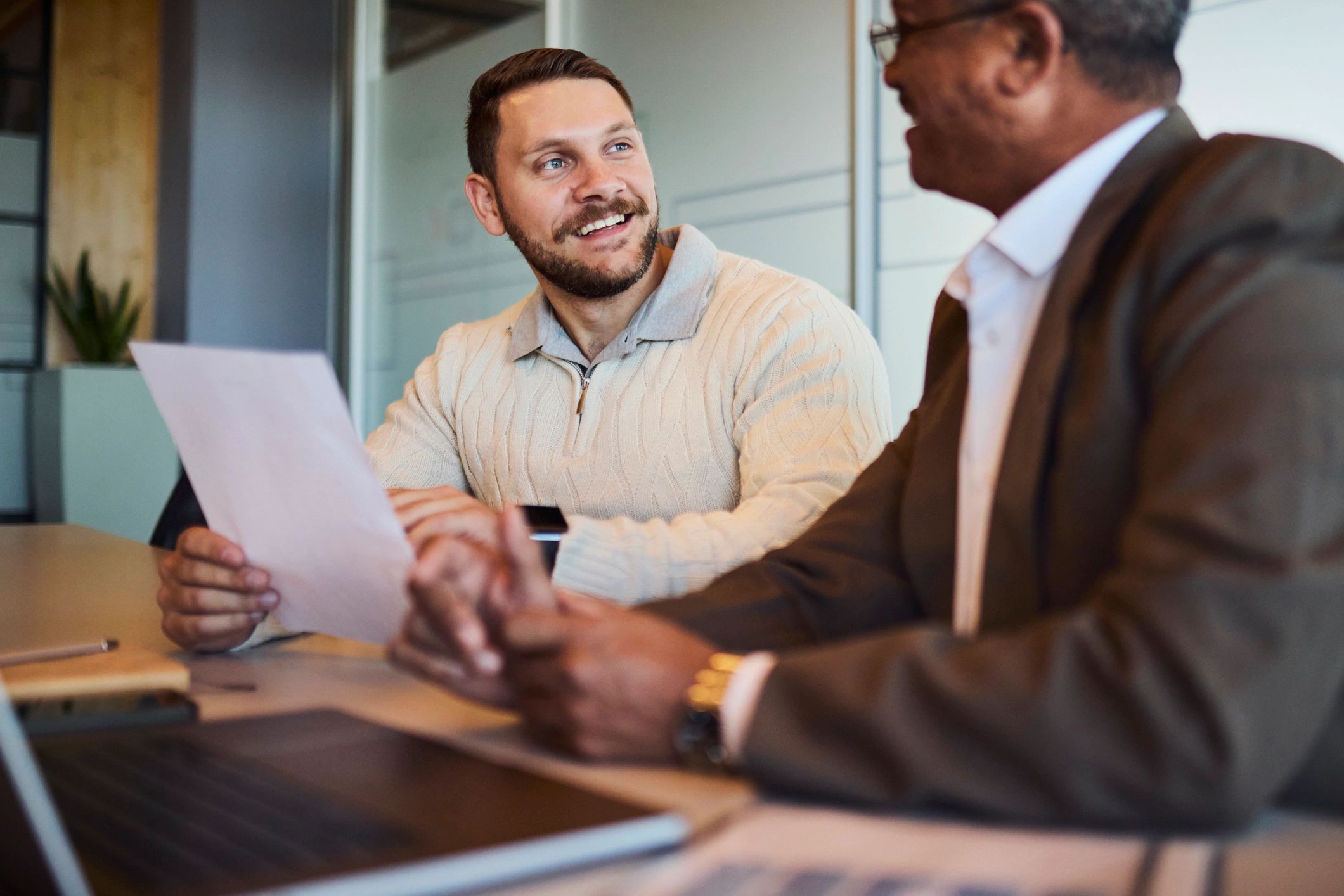 Professional financial consultation at a desk